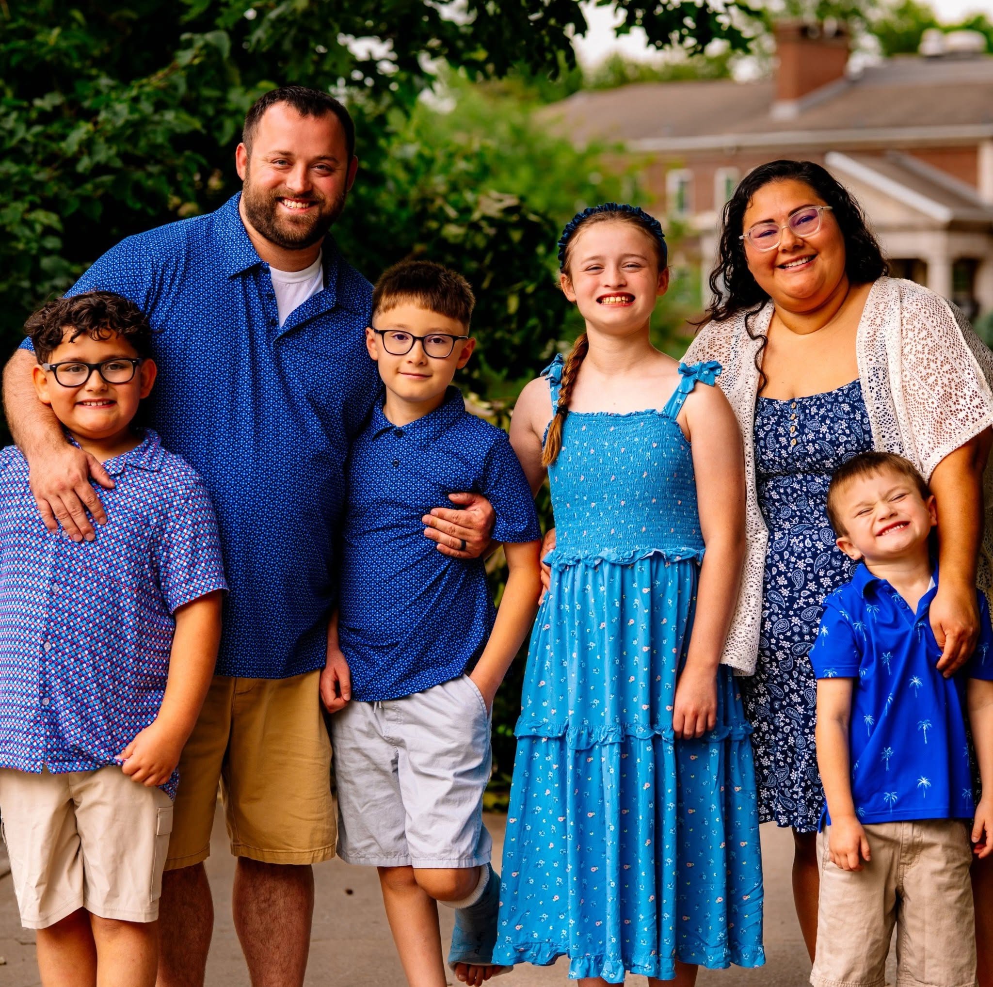 Court Hopkins with his wife and four children